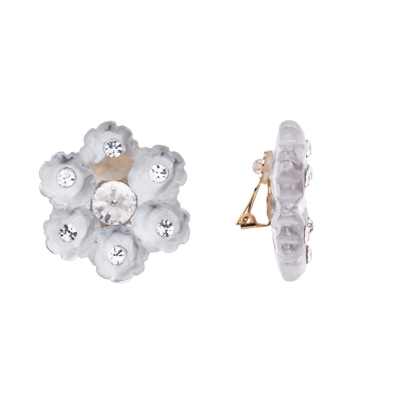 Par de brincos pequenos em resina branca com cristais transparentes.